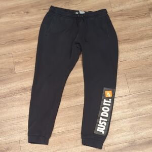 Nike Black Joggers with Orange Accent